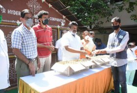 Sekhar-Kammula-Distributes-Milk-To-GHMC-Workers-03