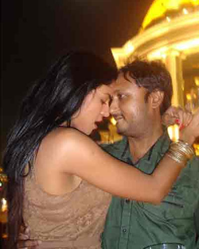 Veena Malik cosy with her director