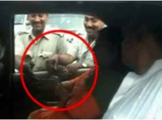 MLA gives money to policemen after release from jail