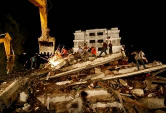 Building collapse causes death toll of 27, injures 60