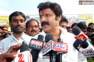Balakrishna punch to his fans in public