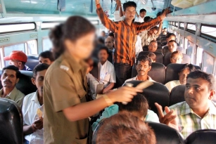 Threatened woman conductor jumps out of a moving bus