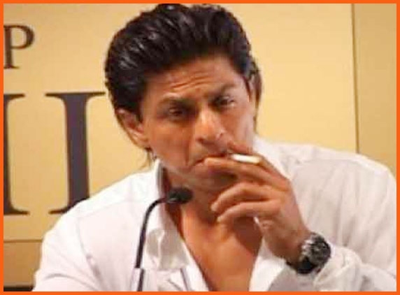 Shahrukh smokes at banned place, falls in legal trouble