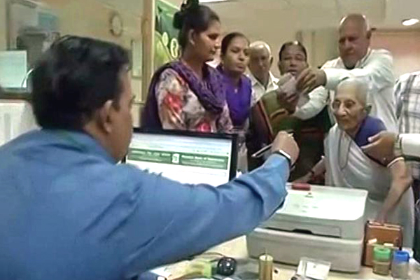 PM Modi Mother Heeraben Modi Visits Bank Pics
