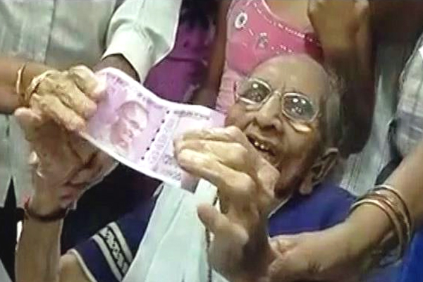 PM Modi Mother Heeraben Modi Visits Bank Pics