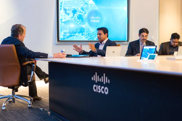 KTR met Cisco Chairman John Chambers Photos