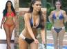 two piece bikini, annual holiday, kim kardashian brightens up domini republic with orange bikini, Kim kardashian hot photos