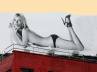 billboard, downtown, kate moss stops traffic in new york with topless show, Confusion