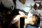 Viral Video, Andhra Pradesh power problem, ap doctor uses phone torch for treatment, Video
