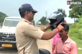 Cop helmet awareness, Cop helmet awareness viral video, viral video cop s trick to spread helmet awareness, Cop helmet awareness