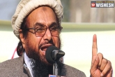 Terrorist organisation JuD's chief Hafiz Saeed, Indian Home Minister Rajnath Singh, designated terrorist saeed warns on rajnath s arrival in pakistan, Rival