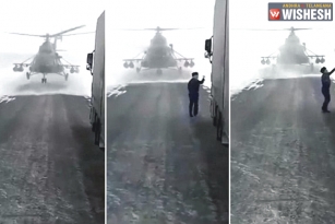 Kazakhstan: Helicopter Lands on the Road, Pilot Gets Down to ask Direction