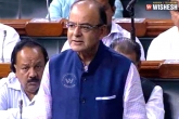 Slogans, Lok Sabha, lok sabha passes the bill to tax money amid chaos, Logan