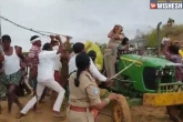 Telangana forest officer attacked, Telangana forest officer viral video, telangana forest officer assaulted by brothers of trs mla, Rs brothers