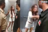woman strips, woman strips in elevator, woman strips off in lift when cops wanted her to come to police station, Trips