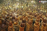weird news, weird news, chinese man carves 9 200 buddha statues from dead trees, Trees