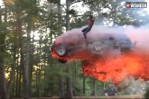 man jumps from fire car, Man jumps out of car in the air, viral man jumps out of car in the air, Up in the air