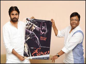 Pawan gifts ISM book to Kona Venkat