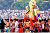 Ganesh immersion, ganesh nimajjanam, ganesh immersion in hyderabad held grandly, Ganesh nimajjanam