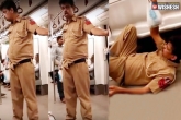 drunk police train, police drunk in train, viral drunken police behavior in public train, Behavior