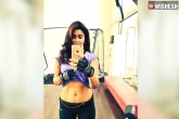 Tollywood news, Tollywood news, shriya saran lifts shirt to show navel, Hot photos