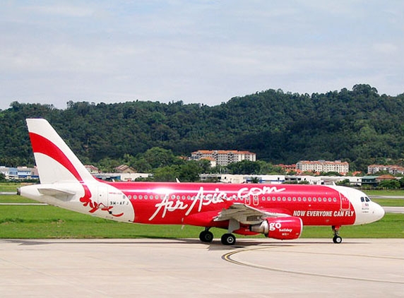 Air Asia, Tata Sons team up for low cost airline