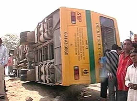 10 injured as school bus turns turtle