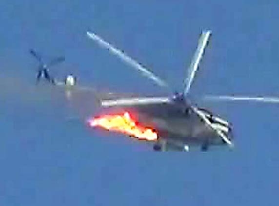 Syrian rebels bring down a helicopter