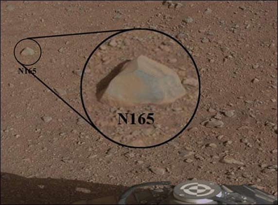 Curiosity burns a hole in Martian rock